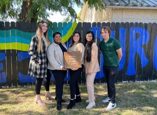 A group of people posing for a photo.