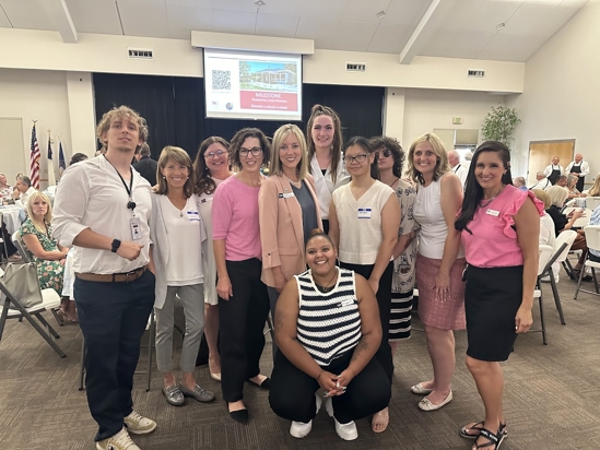 A group of women posing for a photo.
