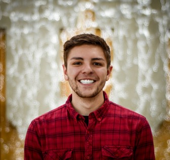 A man smiling for the camera.