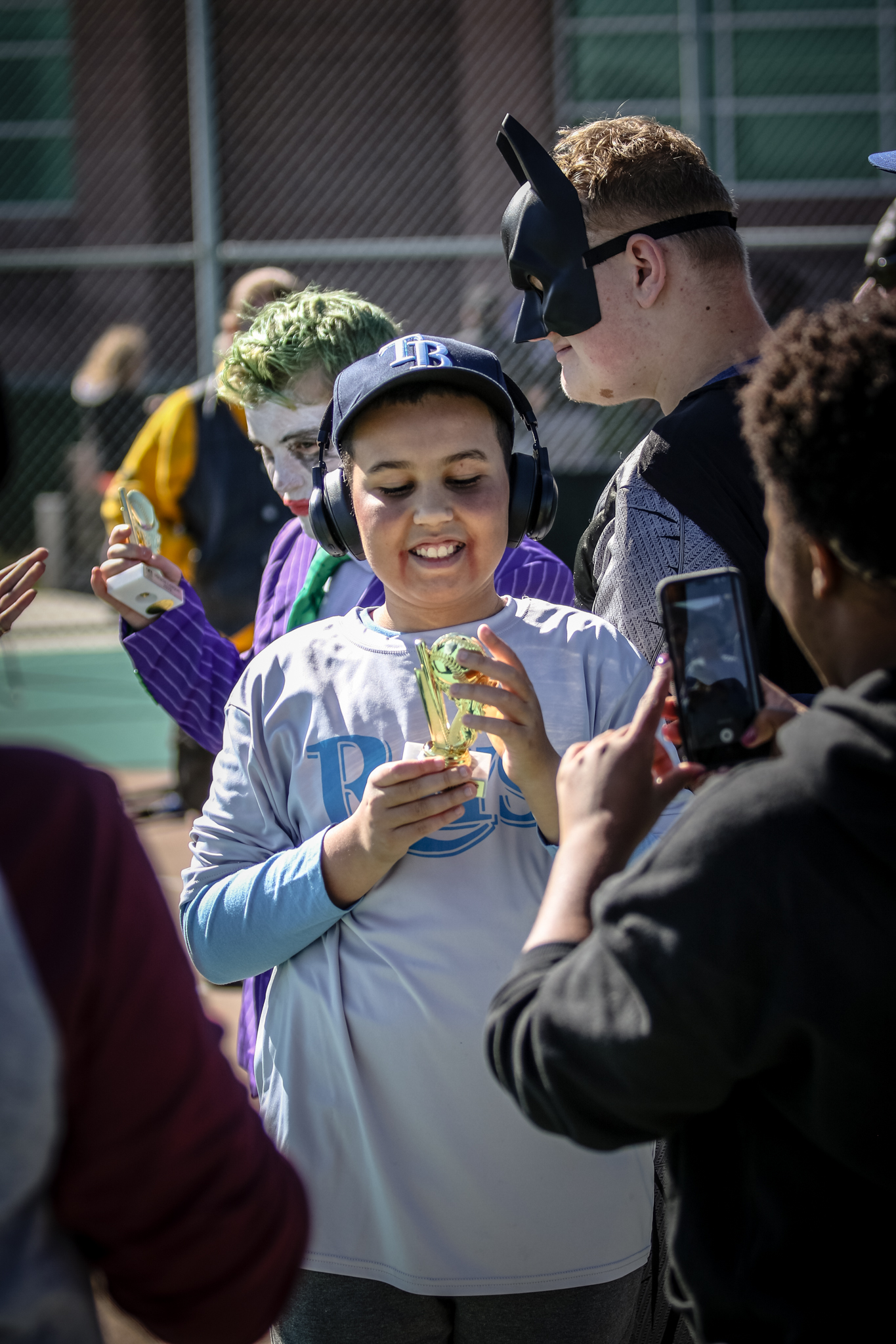 A man holding a cup of ice cream.
