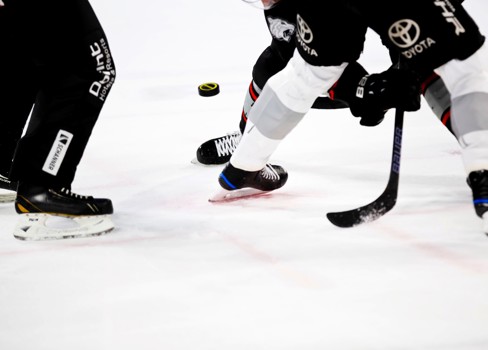 A hockey player in a uniform.
