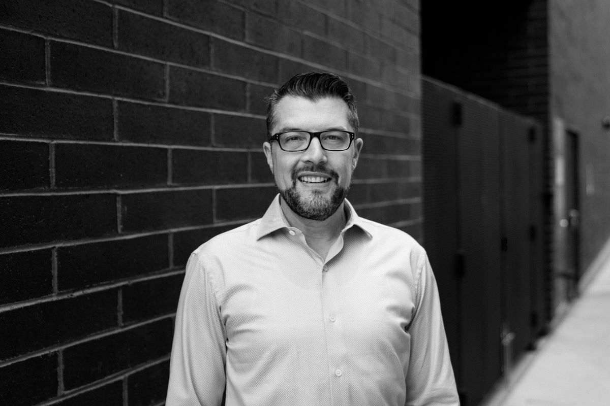 A man wearing glasses.