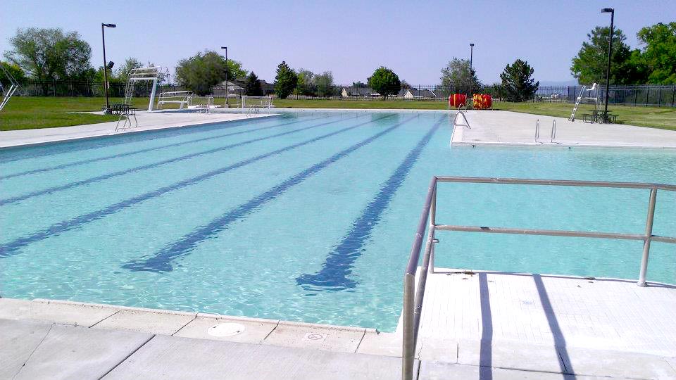 A swimming pool with a ramp.