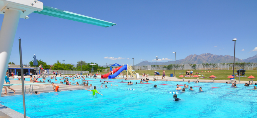A large pool with people in it.